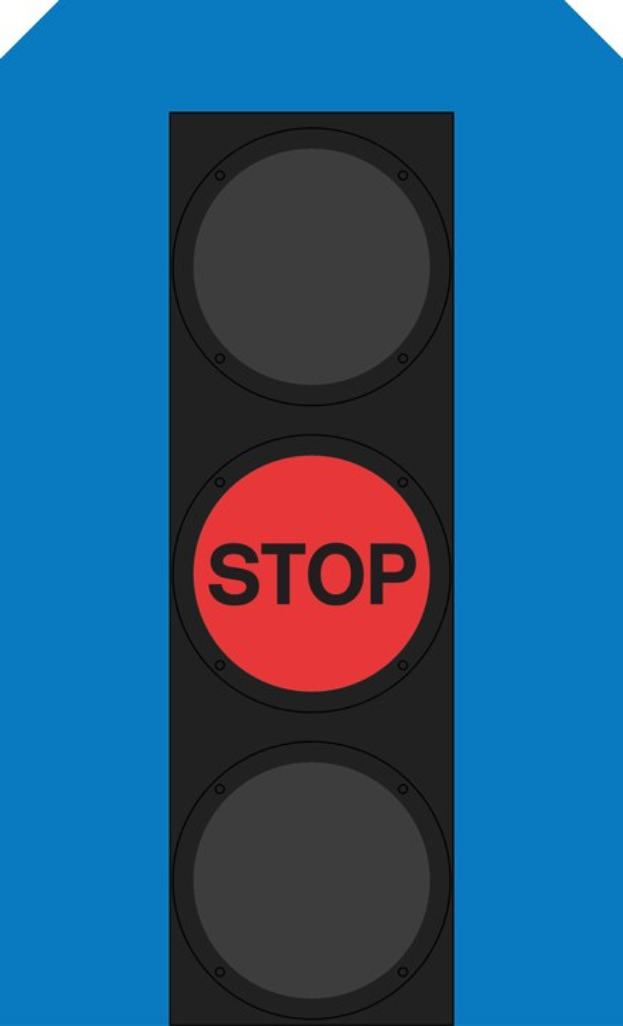 Verkehrsampel mit rotem Stoppschild vor einem blauen Himmel.