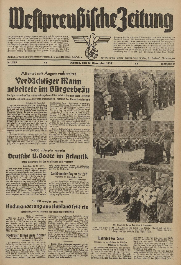 Schwarze und weiße Titelseite einer deutschen Zeitung vom 13. November 1939 mit der Überschrift "Weitpreubliche Zeitung", die eine Gruppe von Menschen in traditioneller deutscher Kleidung in einer feierlichen Umgebung zeigt.